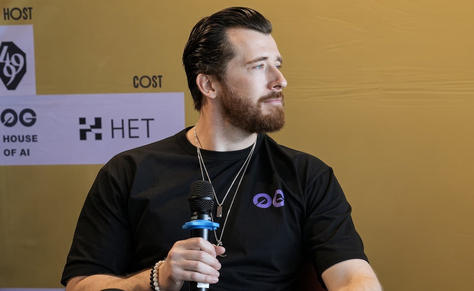 Michael Dressler speaking on a panel at The Scaling Summit: House of AI, ETHDenver 2026
